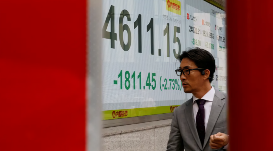 Asia Stocks Waver As Yen Surges, Iran Warns of Retaliation